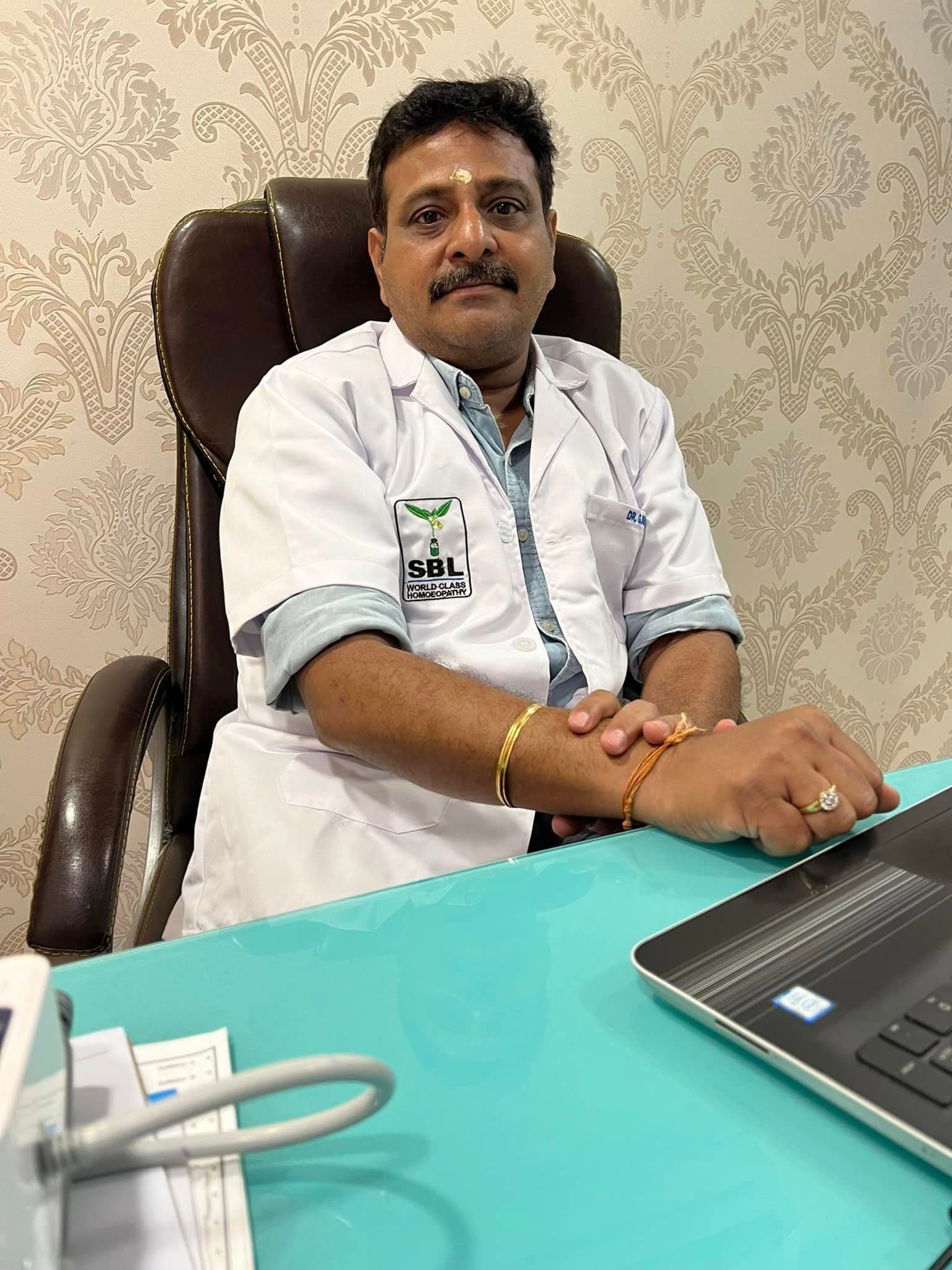 Portrait of Dr. G. Nirmal at Niveena Homeo Clinic